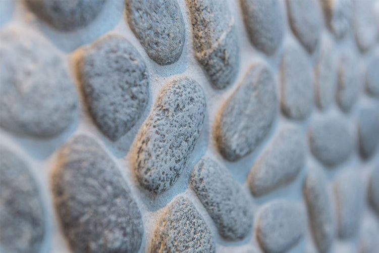 How to Glue River Rocks on a Wall & Floor