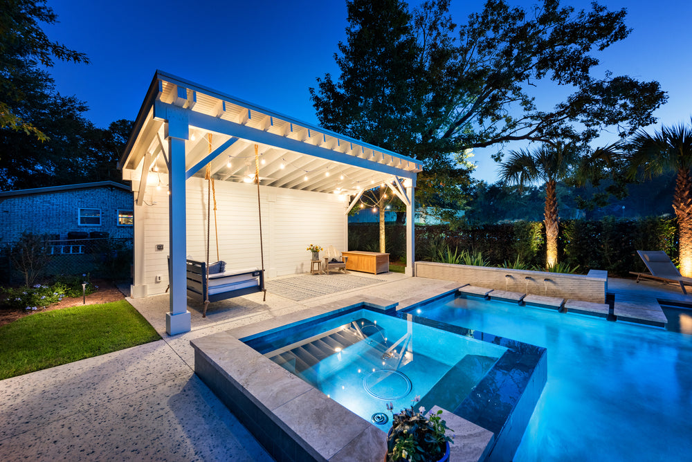 Crescent Mini Sandstone Mint on a pool water feature wall